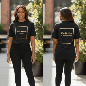 Woman modeling a black t-shirt with gold text on front and back.